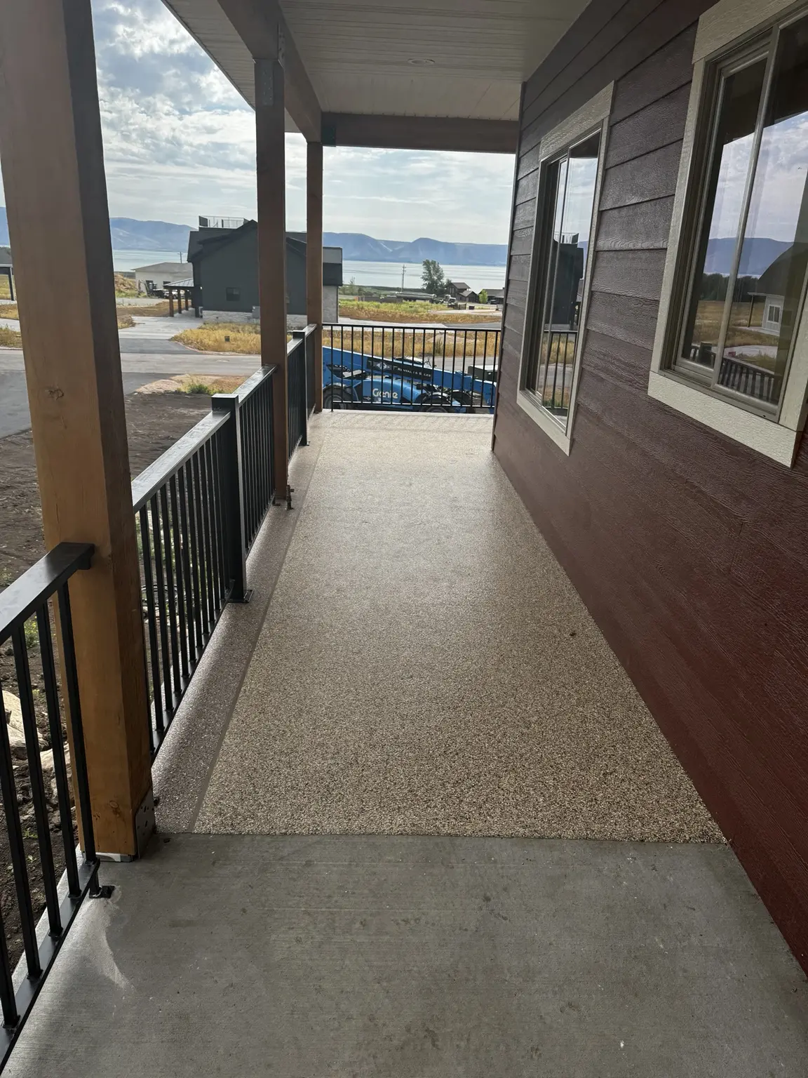 Completed waterproof deck coating overlooking Bear Lake and the surrounding mountains