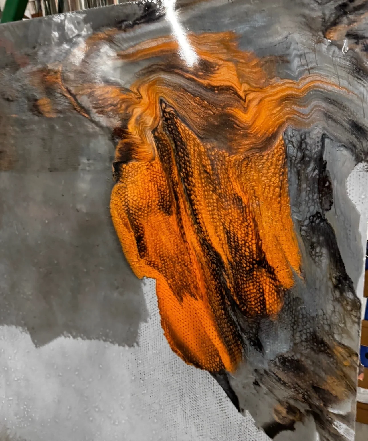Copper and charcoal marbled metallic epoxy finish